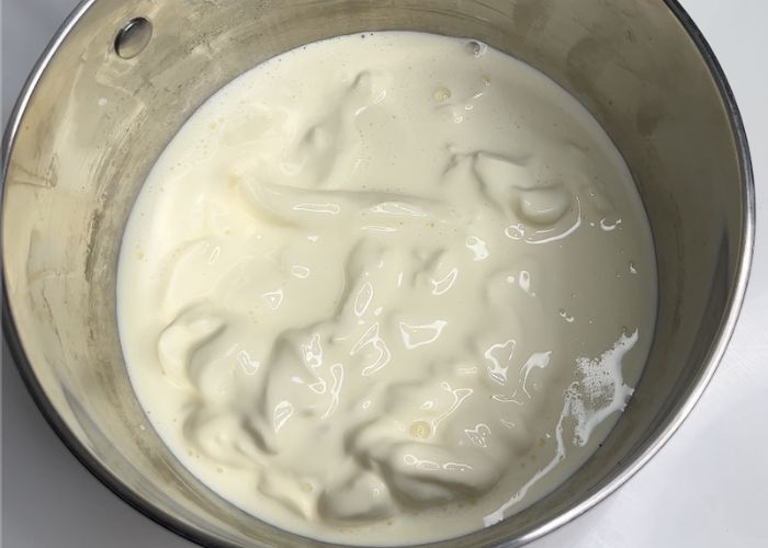 take cream in a sauce pan for making panna cotta