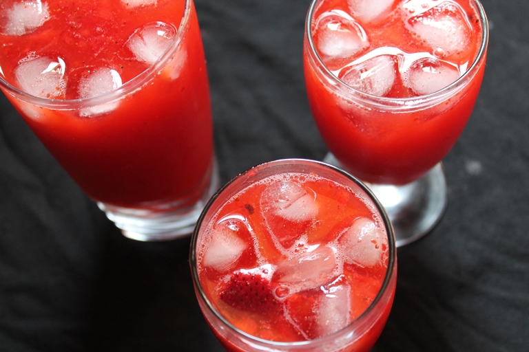 three serving of strawberry lemonade 
