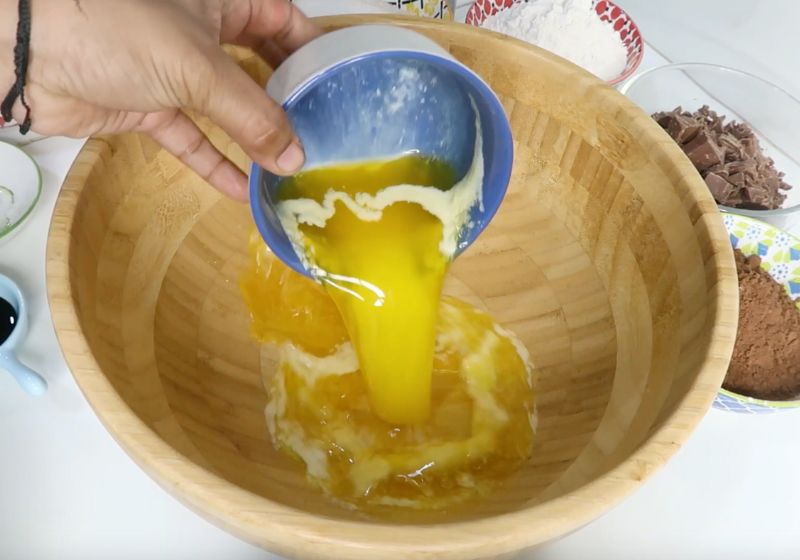 take melted butter in a mixing bowl