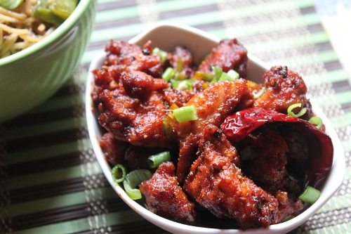 chilli chicken dry garnished with spring onions