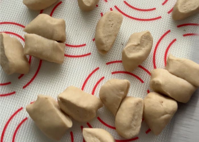 divide poori dough into equal portions