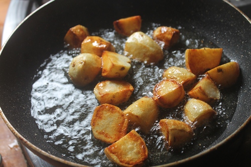 fry potatoes till golden 