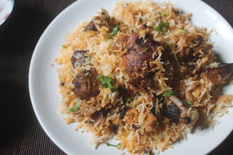 biryani served in white plate