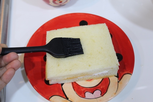 brush top with sugar syrup