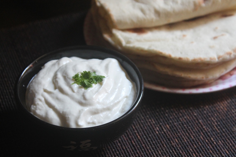 garlic sauce also known as toum served with pita bread