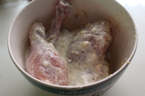 chicken marinating in yogurt, salt and ginger garlic paste
