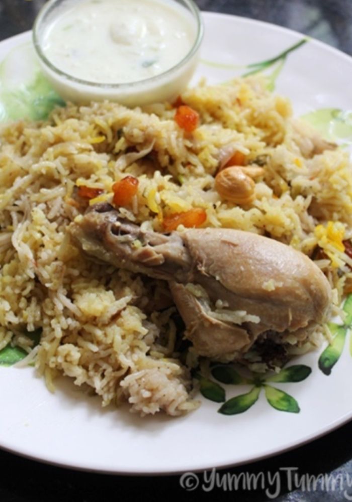 chicken pulao served with onion raita