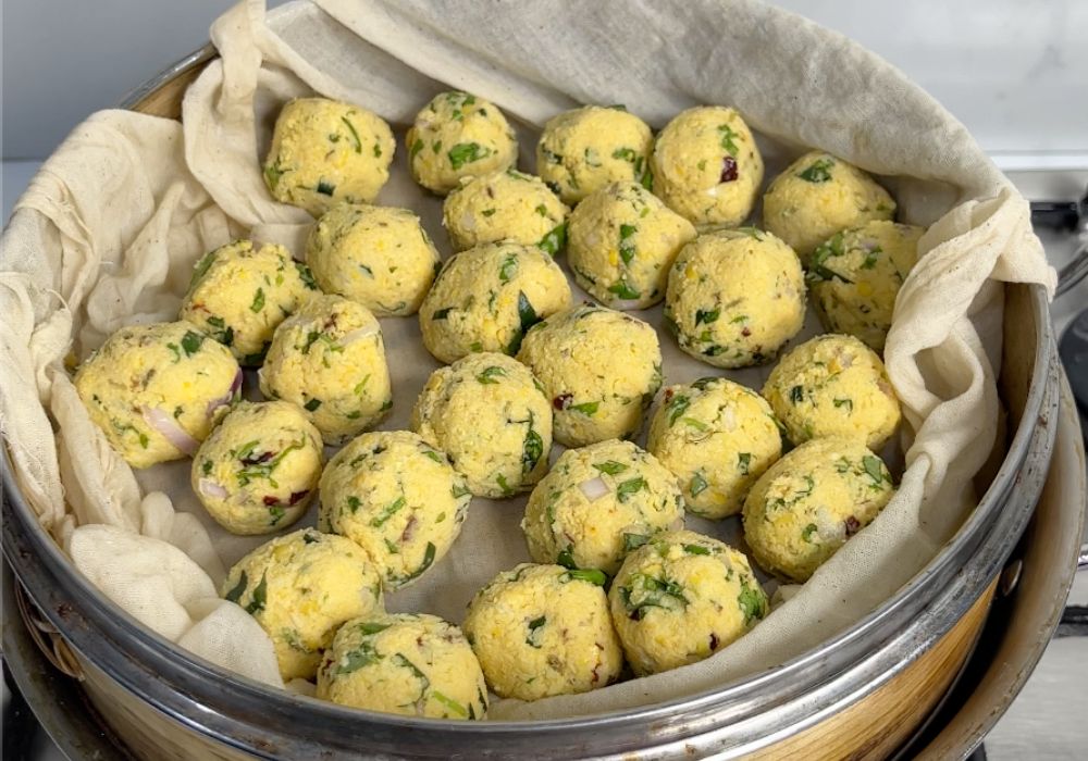 dal balls placed in steamer