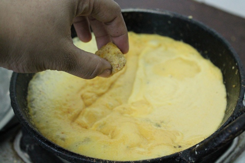 add dal balls to boiling kuzhambu