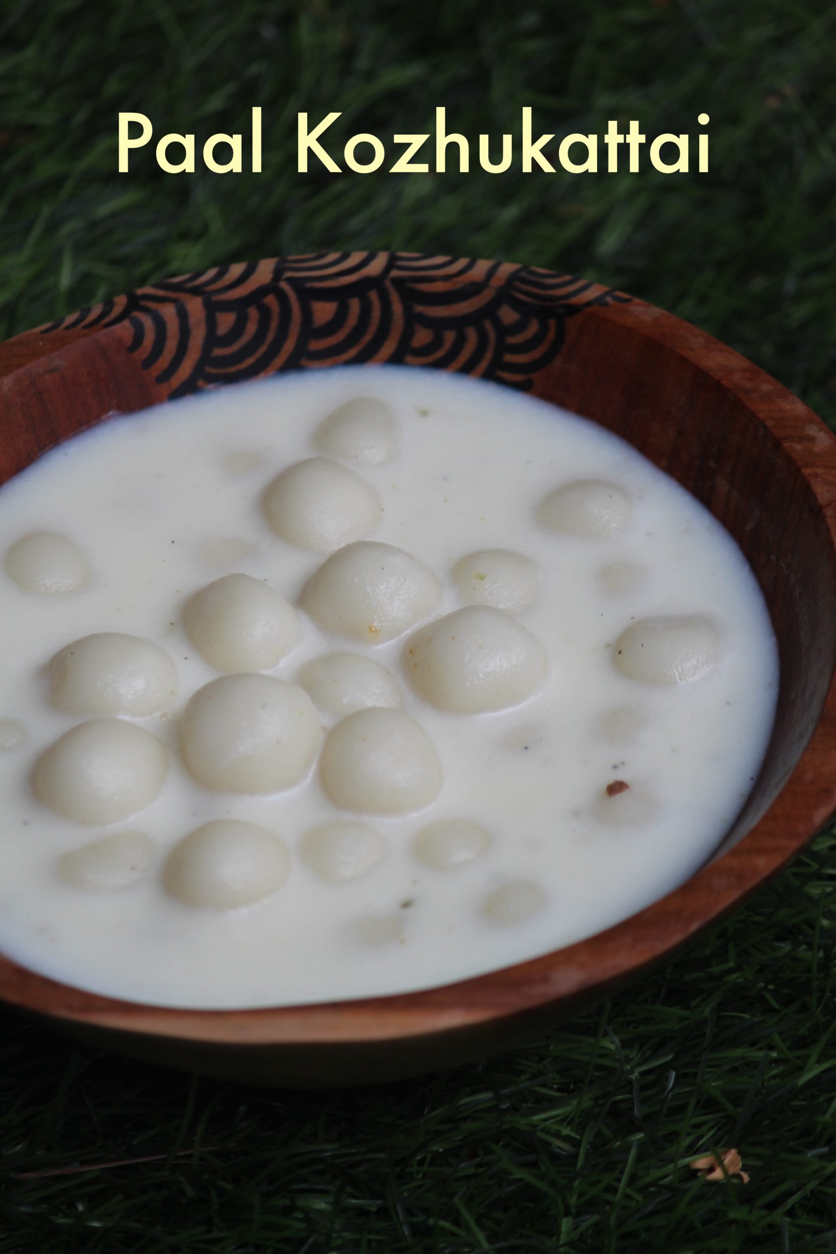 paal kolukattai served in a bowl
