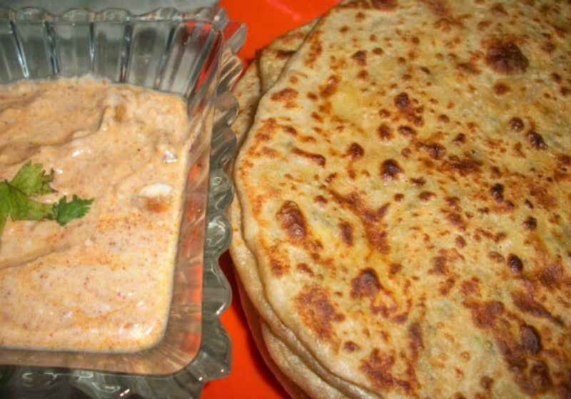 fresh aloo paratha served with pickle curd