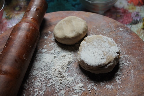 for method 2 of rolling aloo paratha. take two balls