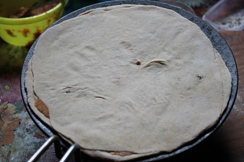 place paratha in hot tawa