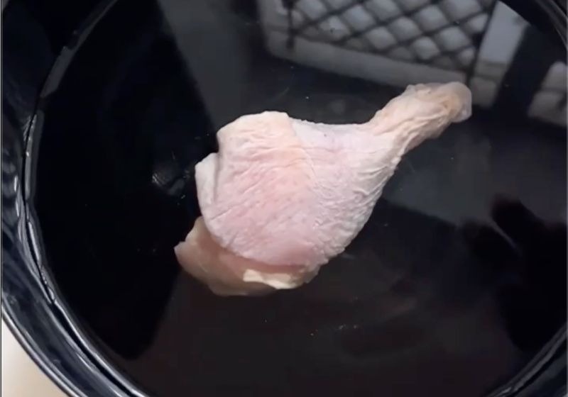 dip chicken in ice cold water for 7 seconds