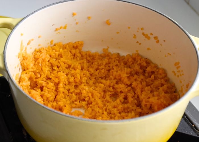 add grated carrots and saute for 4 to 5 minutes