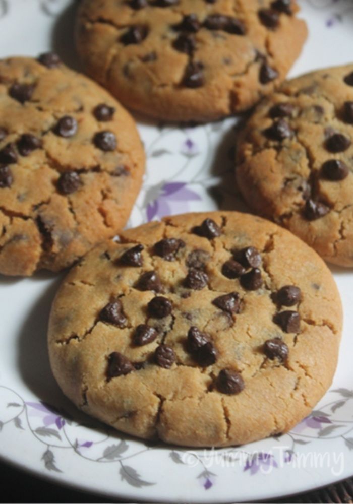 four Eggless chocolate chip cookies in a plate