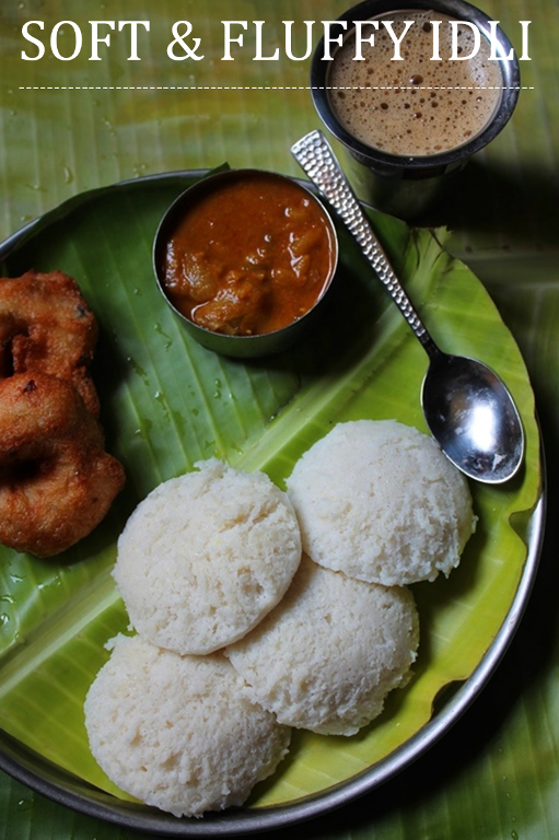 close shot of idli served on a banana leaf with medu vada, sambar and filter coffee