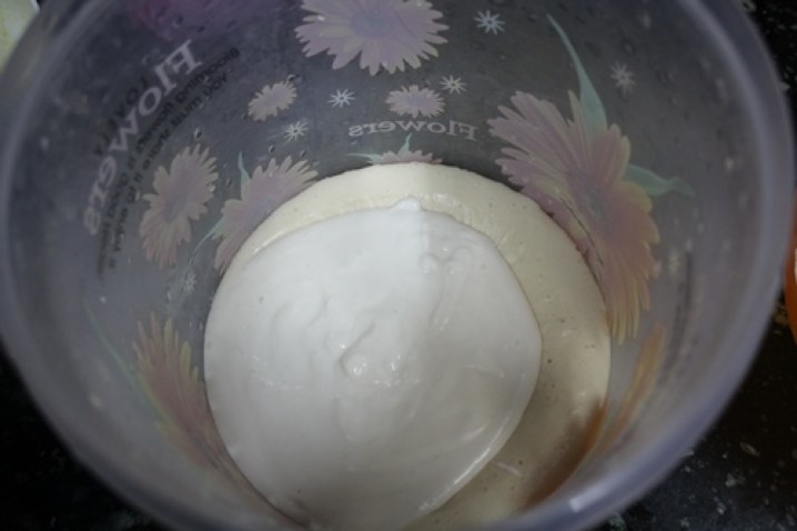 rice paste poured over urad dal batter