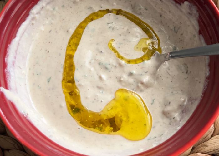 drizzle tahini sauce with extra virgin olive oil