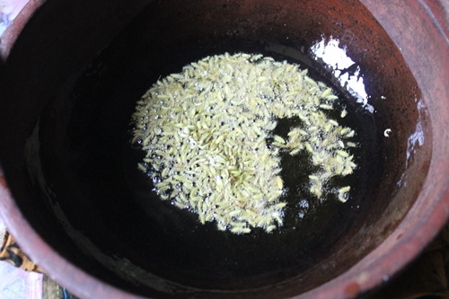 heat oil and add fennel seeds