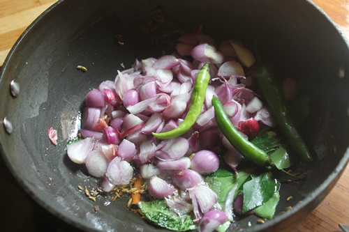 add curry leaves, shallots and chillies