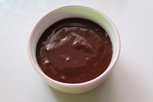 pour brownie batter in