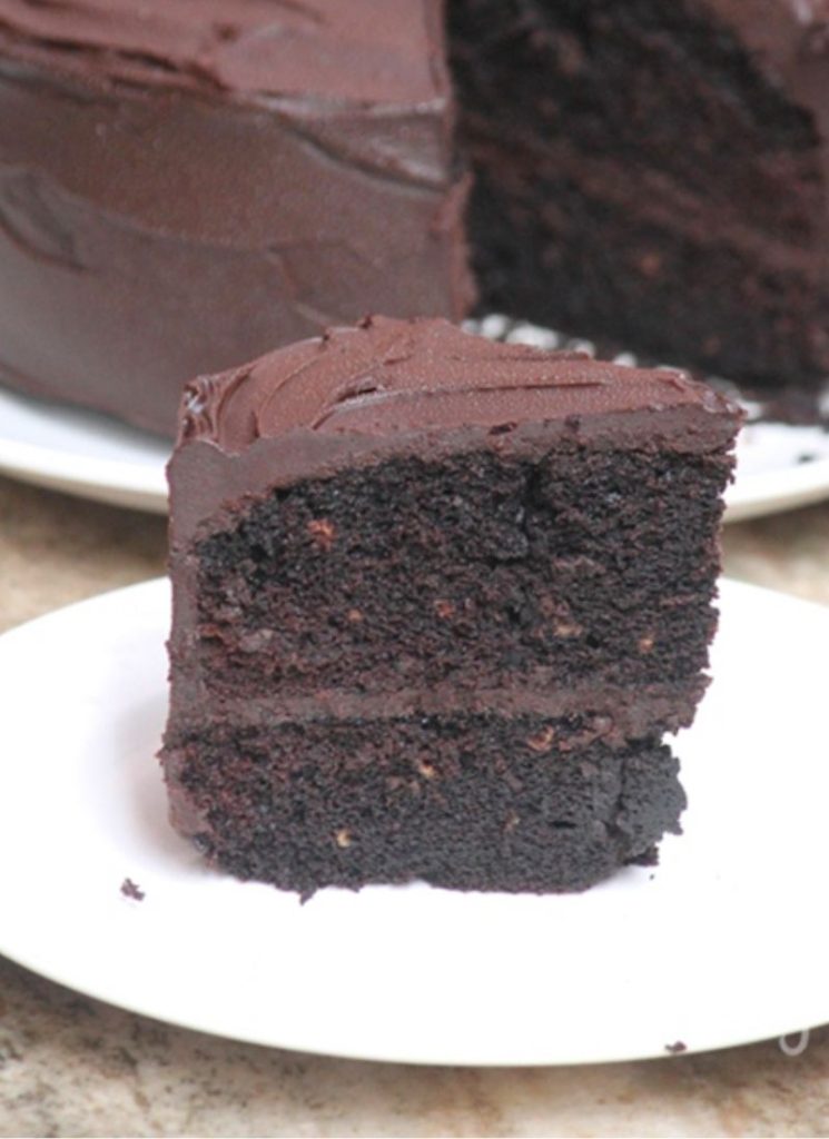close shot of a slice of eggless chocolate cake