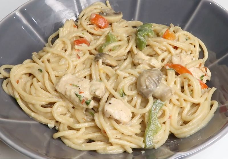 a bowl of creamy chicken pasta