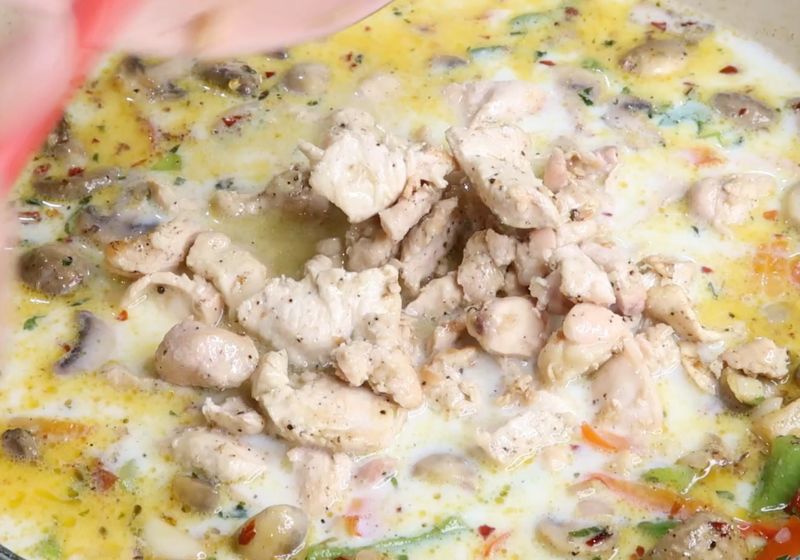 add cooked chicken for making creamy chicken pasta