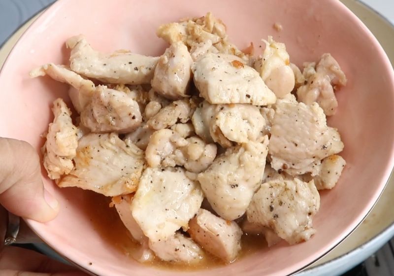 remove cooked chicken in a bowl and set aside.