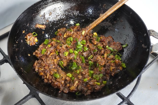 add in spring onions