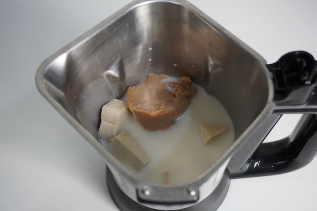 take tofu, miso and soy milk in a blender