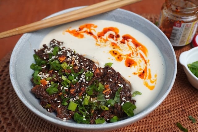 pour tofu sauce and decorate with chilli oil