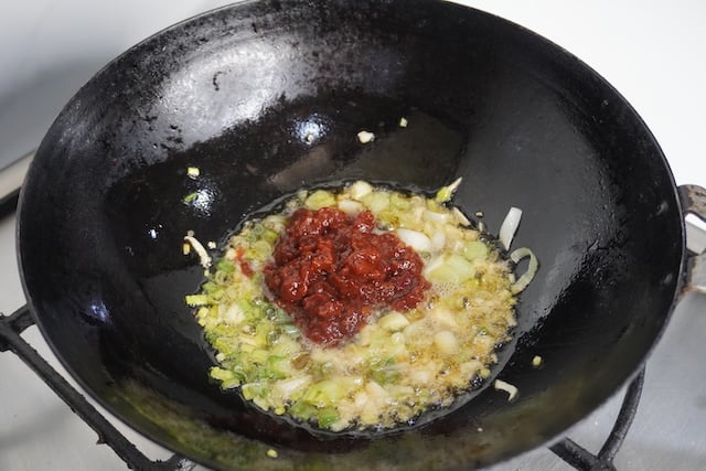 add in chilli bean paste